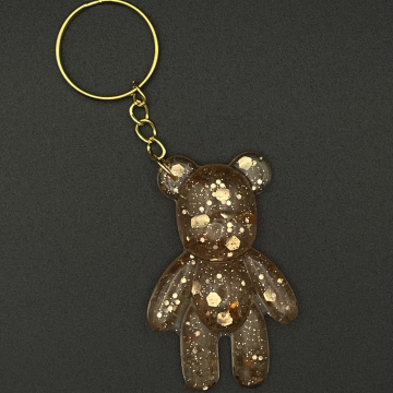 Porte-clef ourson pailleté or rose