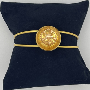 Bracelet jonc cabochon engrenage doré