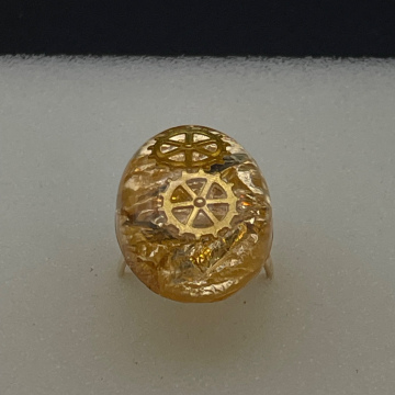 Bague ovale engrenages et feuilles métallisées dorées