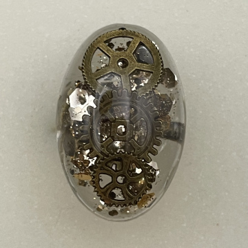 Bague grand ovale engrenages et paillettes bronze